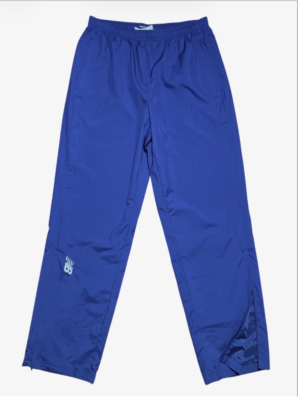 New Balance Men's Lightweight Zip Hem Track Pants in Blue Sz M